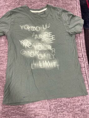 Green Graphic Tee with Faded White Text